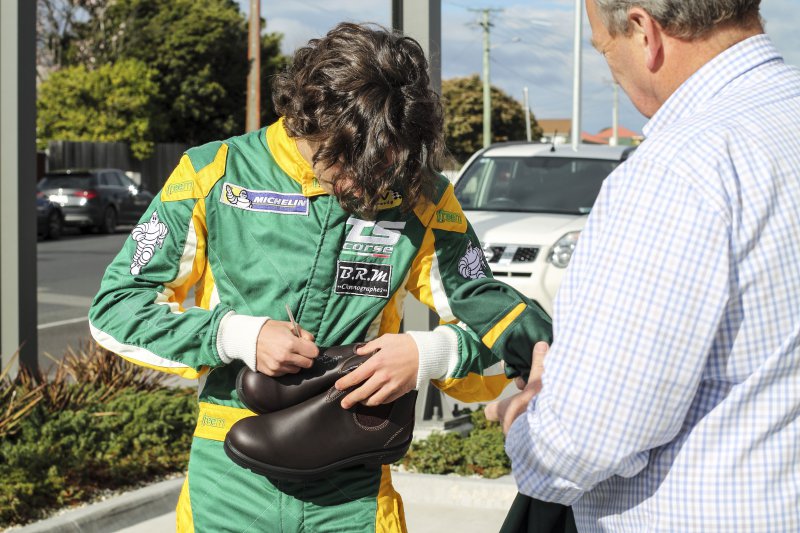 Autographing a pair of Blundstone boots with Blundstone CEO Steve Gunn